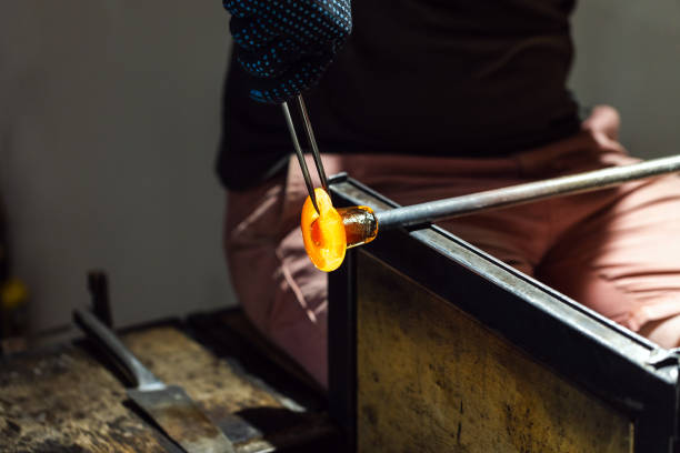 istock Molding molten glass, glass blowing workshop 2171095862