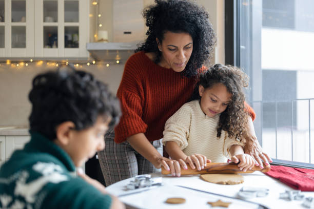 istock Family Baking Together in Cozy Kitchen 2171096577