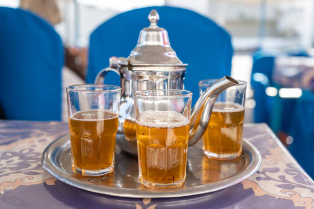 istock Moroccan Mint Tea in Teapot and Glass, Traditional Morocco Drink 2171098262