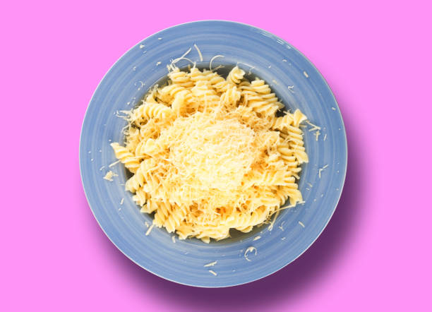 istock Pasta with Grated Cheese on Blue Plate 2171098944