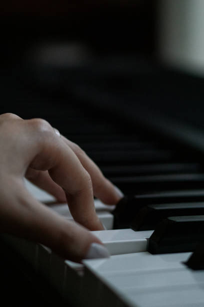 istock Piano keys person plays classical music black and white 2171102968