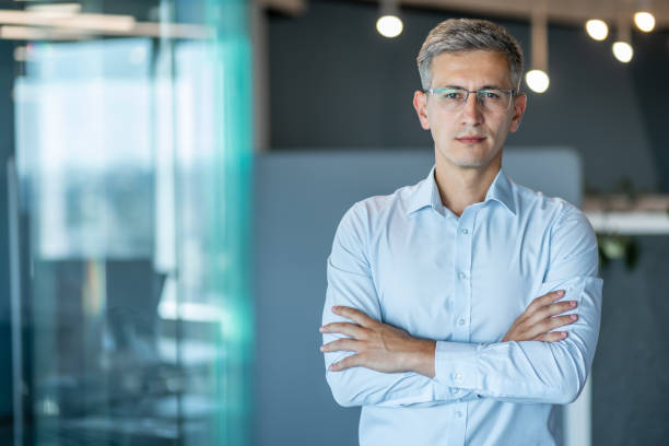 istock Confident Businessman Standing In Modern Office Environment 2171103598