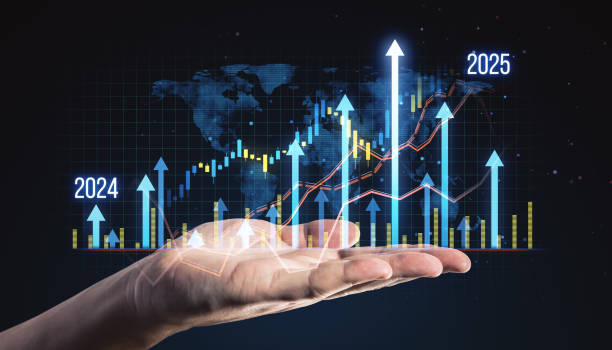 istock Digital graph with upward arrows and financial data on a virtual screen held by a hand, showcasing growth and progress. 2171106732