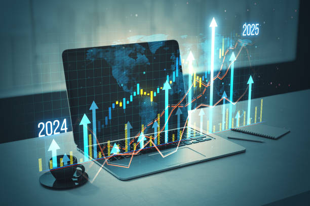 istock Digital graphs and charts displaying business growth on a laptop screen with futuristic holographic overlays. 2171106733