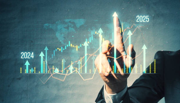 istock Business professional pointing at a rising virtual graph with arrows indicating growth for 2024 and 2025. 2171106736