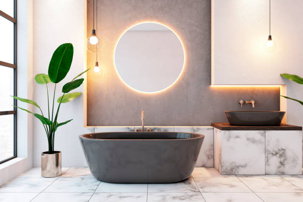 istock Modern bathroom interior with circle mirror and freestanding bathtub. 3D Rendering 2171106817
