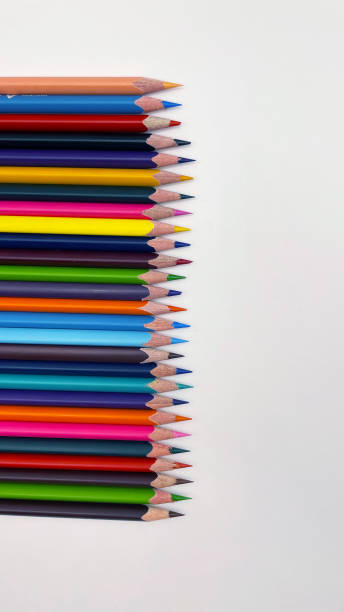 istock Colorful sharpened pencils are lined up on the table. 2171107491