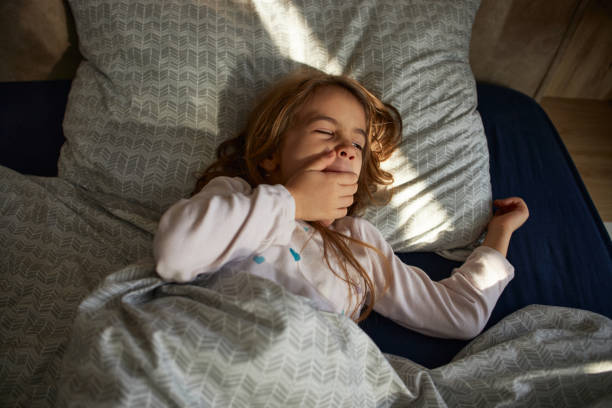 istock Adorable little girl sleeping 2171107588