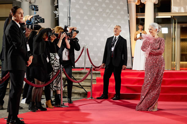 istock Cheerful celebrity posing for event photographers 2171110101