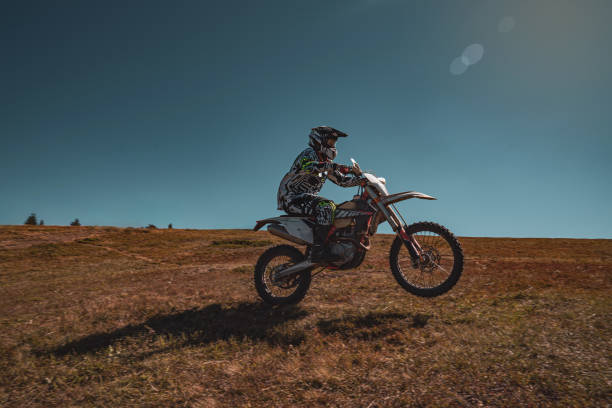 istock A motocross rider's adventure on a sunlit trail 2171119265