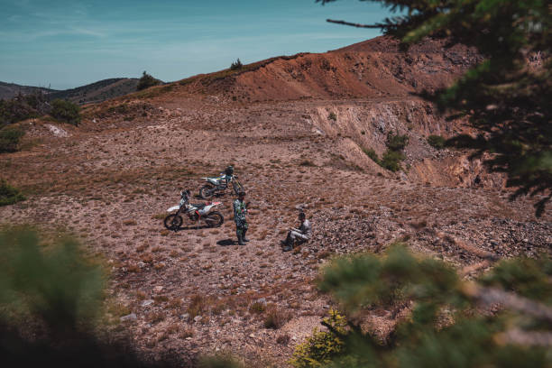 istock Motocross riders taking a break from riding 2171120104