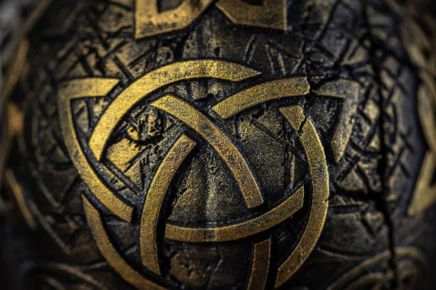 istock Close-up of golden Celtic ornaments 2171128155
