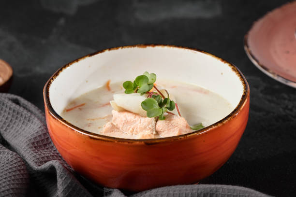 istock Creamy Fish Soup in Rustic Ceramic Bowl on Dark Background 2171129130
