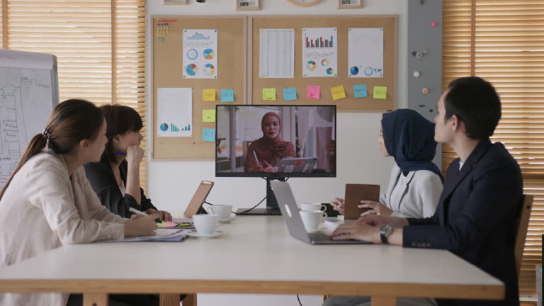 Business team on video call with customer