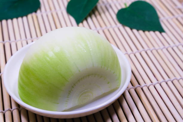 A close-up of bluish onions. You can feel the freshness.