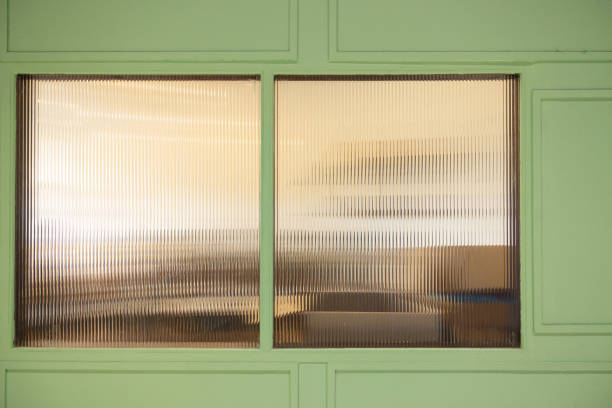 istock The window is covered with a thin, wavy glass or Transparent material Corrugated plastic. 2171142443