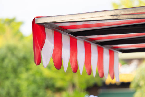 istock A red and white striped awning with a white stripe on the bottom 2171142534