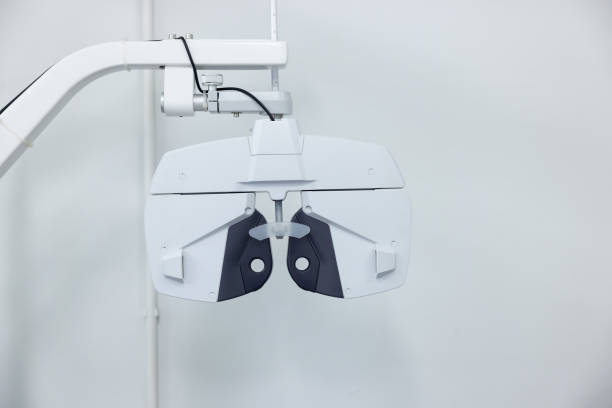 istock modern Phoropter eye test on white wall in optic shop. 2171142721