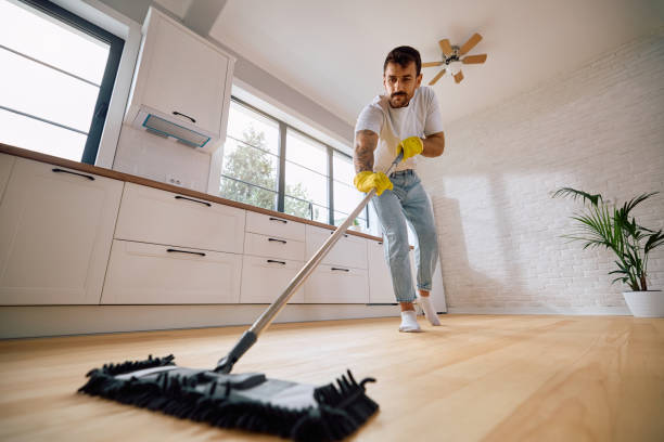 istock Below view of man mopping the floor in the kitchen. 2171143197