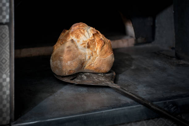 Homemade sourdough bread, nicely baked with a crust, The process of baking artisan