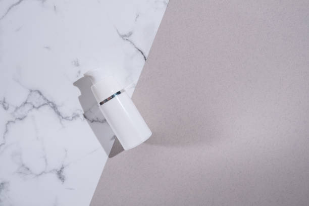 istock Container for cream, shampoo, toiletries, spa. Unbranded white plastic bottles. Bottle with a dispenser for cosmetic products. Skin care and beauty concept. Mockup style, copy space 2171158110