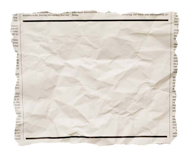 istock Wrinkled newspaper clipping with blank space for your copy 2171159183