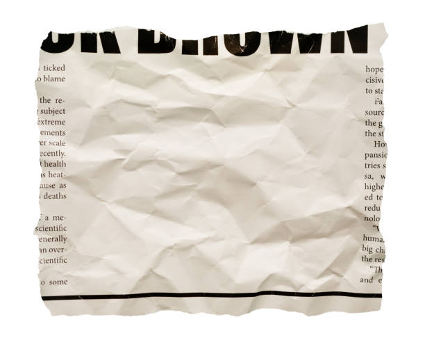 istock Wrinkled newspaper clipping with blank space for your copy 2171159230