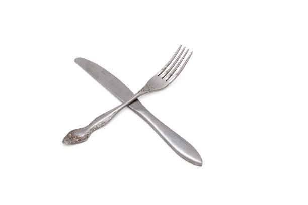 Table arrangement background. Clean shiny metal cutlery.