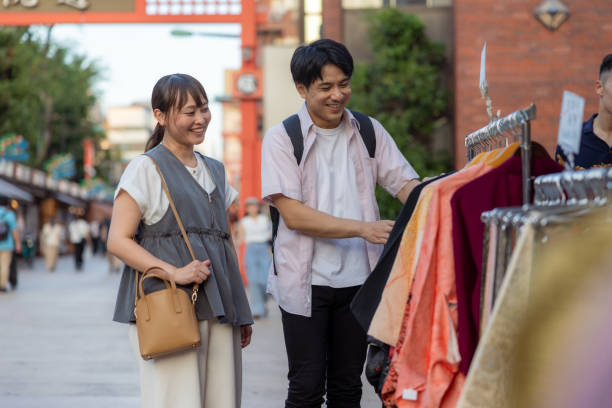 istock Couple shopping together at travel location 2171165708