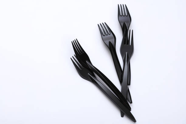 istock Black plastic forks on a white background 2171169288