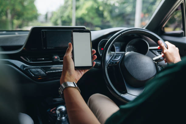 istock Happy driver from a car request service driving 2171169396