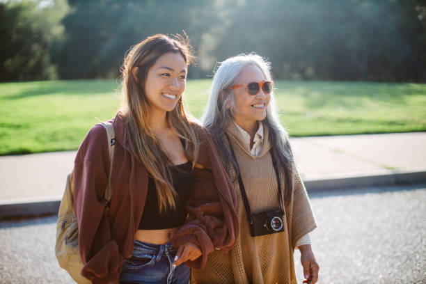 istock mom and daughter spending time in nature together 2171169740