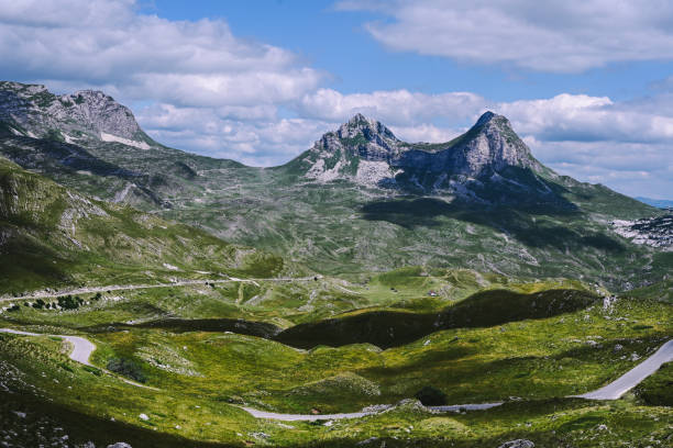 istock Panoramic Mountain Range and Views - Alpine style Alps in Durmitor, Montenegro - Wide Landscape Shot of epic Mountains and Roads 2171171230