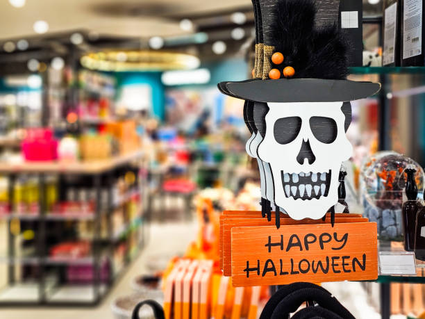 A retail display of Halloween decorations for sale in the store.