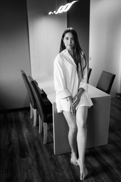 Girl walks around the city in the morning. Black and White