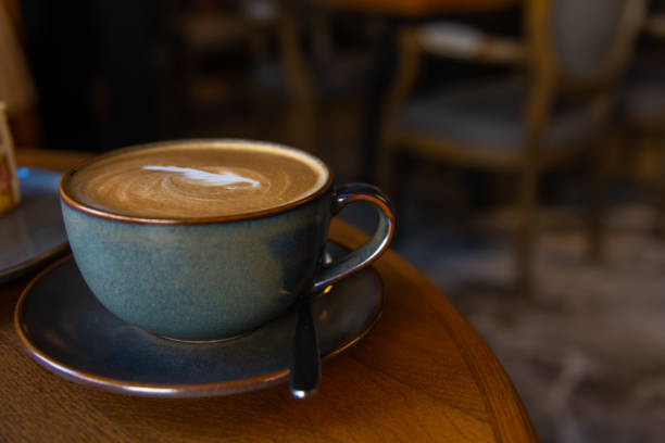 istock Cup of coffee on table in cafe 2171178228