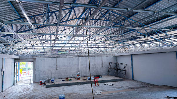 istock Ceiling installation with expert technicians In the room that is in the construction process. 2171182845