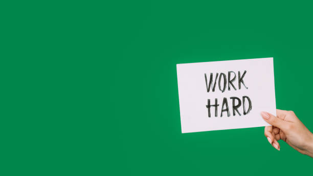 istock Work hard motivation word hand lettering text sign 2171189041