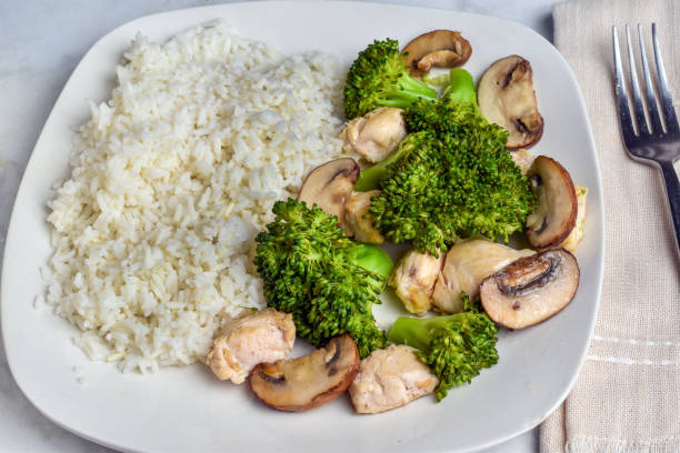 istock rice with broccoli and mushrooms 2171190402