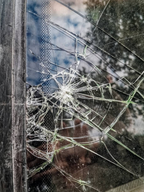 istock A close-up view of a shattered car window with multiple cracks radiating from a central point 2171193051