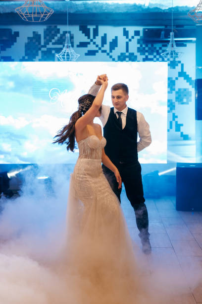 istock the first dance of the bride and groom inside a restaurant 2171193131