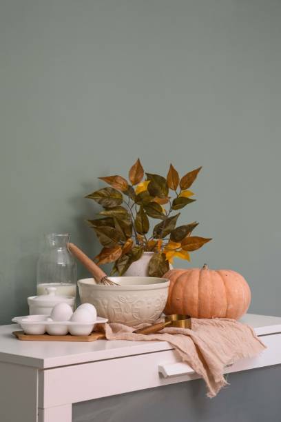 istock Rustic Kitchen Decor featuring a charming Pumpkin and classic Mortar, perfect for autumn 2171195421