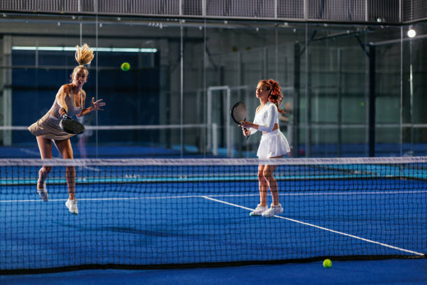 istock Two female padel teammates during a padel match point 2171195774