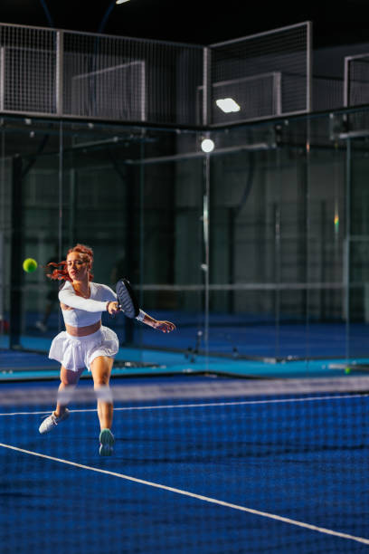 istock Redhead female padel player during a singles match 2171195785
