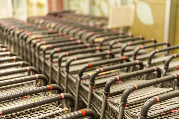 Material of several carts lined up in a supermarket