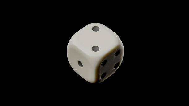 istock A single, worn ivory die with black pips rests against a black background 2171201978