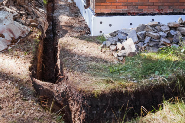 istock Laying pipes for groundwater drainage. Pipelines. Pipe and hatch. 2171202943