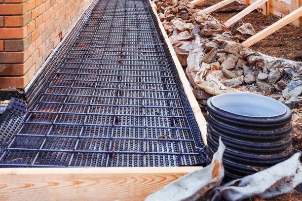 istock Wire mesh piles for construction. BRC welded steel wire mesh for concrete slab reinforcement of construction construction site, foundation reinforcement 2171205349