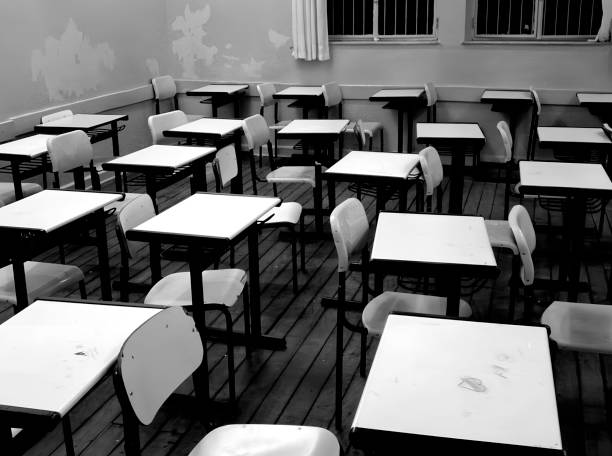 Desks in an empety classroom Interior night shot