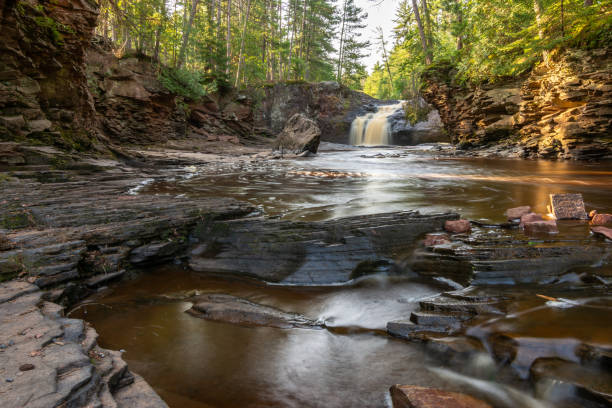 istock Upper Falls in the morning light.  Amnicon Falls state park, South Range, Wisconsin, USA. 2171210511